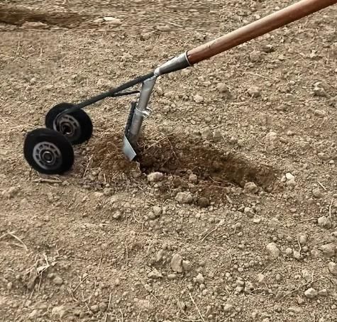 Two-Wheel Soil Loosening Tool